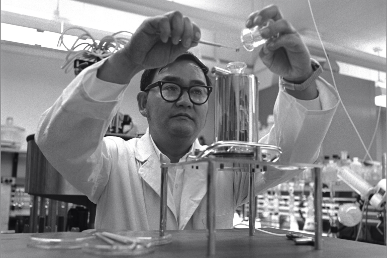 Life Detection Systems Branch Chief Vance Oyama Examines Apollo 11 Samples CREDIT : NASA