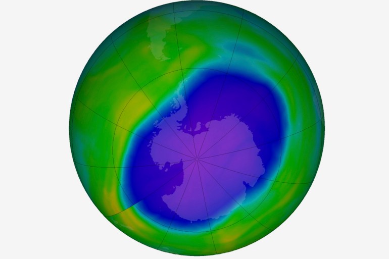 In this NASA false-color image, the blue and purple shows the hole in Earth's protective ozone layer over Antarctica on Oct. 5, 2022. It has generally been shrinking but grew to a moderately large size this year because of weather conditions. (NASA via AP)