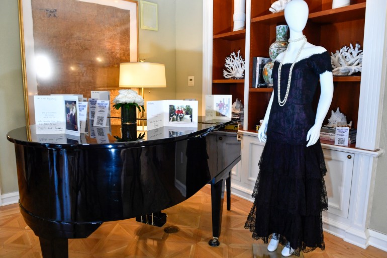 Princess Diana's 1987 Victor Edelstein magenta silk and lace evening dress is displayed during Julien's Auctions' press preview of "Princess Diana's Elegance & a Royal Collection", ahead of an exclusive private showing at the Peninsula Beverly Hills, Beverly Hills, California, June 25, 2024. - The biggest auction of Diana memorabilia since the late British princess sold dozens of outfits months before her death gets underway in California this week, featuring a midnight blue tulle dress and a flamenco-style lace-up number.