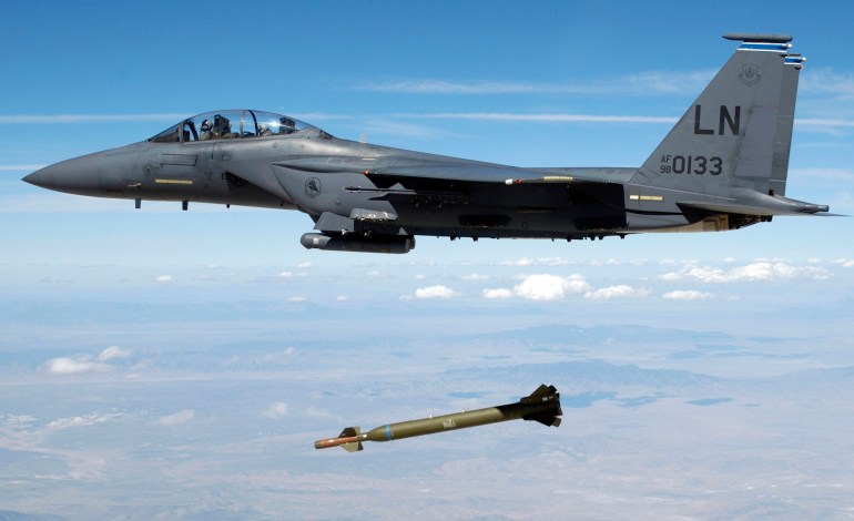 A U.S. Air Force F-15E Strike Eagle aircraft from the 492nd Fighter Squadron, Royal Air Force (RAF) Lakenheath, United Kingdom (UK) releases a GBU-28 "Bunker Buster" 5,000-pound Laser-Guided Bomb over the Utah Test and Training Range during a weapons evaluation test hosted by the 86th Fighter Weapons Squadron (FWS) from Eglin Air ForceBase, Florida, in this August 5, 2003 photograph, obtained by Reuters on August 2, 2009. The Pentagon is seeking to complete the integration of an ultra-large "bunker-buster" bomb on the most advanced U.S. bomber as soon as July 2010, the Air Force said Sunday August 2. REUTERS/Technical Sgt. Michael Ammons/USAF/Handout (UNITED STATES MILITARY) FOR EDITORIAL USE ONLY. NOT FOR SALE FOR MARKETING OR ADVERTISING CAMPAIGNS