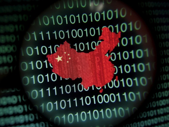 A map of China is seen through a magnifying glass on a computer screen showing binary digits in Singapore, in this January 2, 2014 file illustration photo. Security researchers have many names for the hacking group that is one of the suspects for the cyberattack on the U.S. government's Office of Personnel Management: PinkPanther, KungFu Kittens, Group 72 and, most famously, Deep Panda. But to Jared Myers and colleagues at cybersecurity company RSA, it is called Shell Crew, and Myers' team is one of the few who has watched it mid-assault — and eventually repulsed it. Myers' account of a months-long battle with the group illustrates the challenges governments and companies face in defending against hackers that researchers believe are linked to the Chinese government - a charge Beijing denies. To match story CYBERSECURITY-USA/DEEP-PANDA REUTERS/Edgar Su/Files