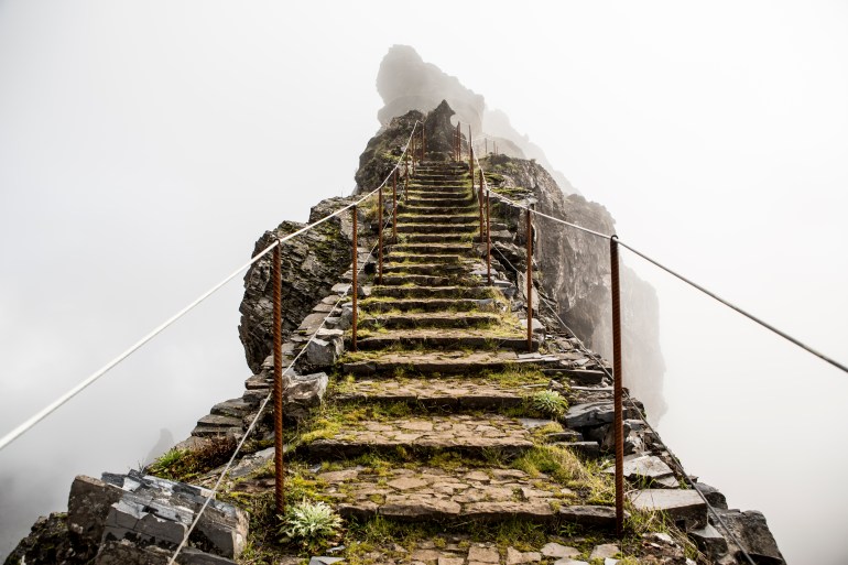 Stairs on a highland trail in the mist. In the mountainous area of Pico do Arieiro, Madeira, Portugal