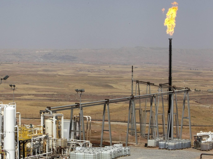 A flame rises from a chimney at Taq Taq oil field in Arbil, in Iraq's Kurdistan region, August 16, 2014. Picture taken August 16, 2014. REUTERS/Azad Lashkari (IRAQ - Tags: ENERGY BUSINESS COMMODITIES)