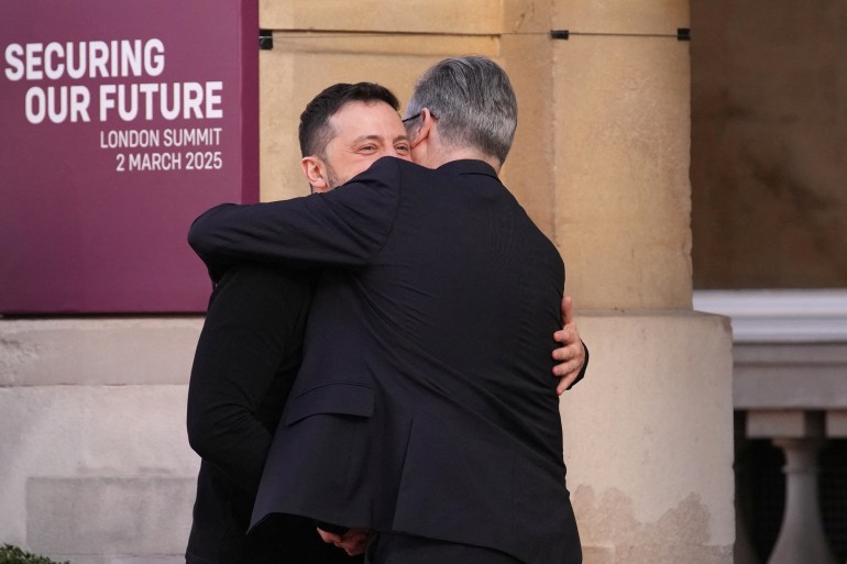 British Prime Minister Keir Starmer hugs Ukrainian President Volodymyr Zelenskiy as he arrives for a summit on Ukraine at Lancaster House in London, Britain, March 2, 2025. Christophe Ena/Pool via REUTERS TPX IMAGES OF THE DAY