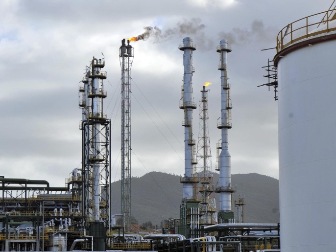 This Jan. 26, 2014 photo shows the Skikda oil refinery, 350 kilometers east of Algiers, Algeria. With oil prices at their lowest in five years, North Africa’s hydrocarbon giant Algeria is feeling the pinch and may have to re-examine generous and massive public spending to confront social unrest. (AP Photo/Anis Belghoul)