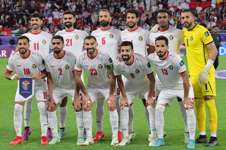 (Top L to R) Jordan's forward #11 Yazan al-Naimat, Jordan's midfielder #21 Nizar al-Rashdan, Jordan's defender #05 Yazan al-Arab, Jordan's defender #04 Baraa Marei, Jordan's defender #03 Abdallah Nasib, Jordan's goalkeeper #01 Yazeed Abulaila, (bottom L to R) Jordan's midfielder #10 Musa al-Tamari, Jordan's defender #02 Mohammad Abu Hasheesh, Jordan's defender #23 Ehsan Haddad, Jordan's midfielder #08 Noor al-Rawabdeh and Jordan's midfielder #13 Mahmoud al-Mardi pose for a team picture during the Qatar 2023 AFC Asian Cup semi-final football match between Jordan and South Korea at the Ahmad Bin Ali Stadium in Al-Rayyan, west of Doha on February 6, 2024. (Photo by Giuseppe CACACE / AFP)