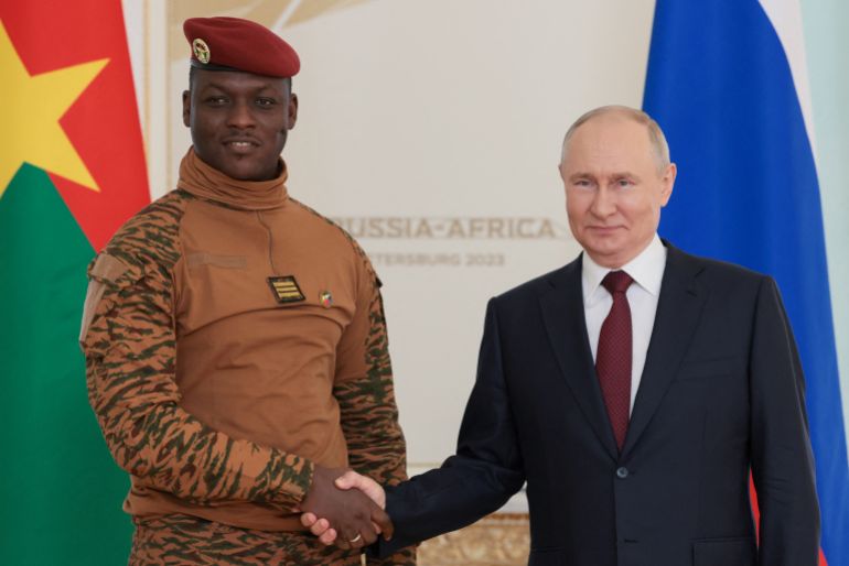 Russia's President Vladimir Putin shakes hands with Burkina Faso's interim President Ibrahim Traore during a meeting following the Russia-Africa summit in Saint Petersburg, Russia, July 29, 2023. Mikhail Metzel/TASS Host Photo Agency via REUTERS ATTENTION EDITORS - THIS IMAGE WAS PROVIDED BY A THIRD PARTY. MANDATORY CREDIT.