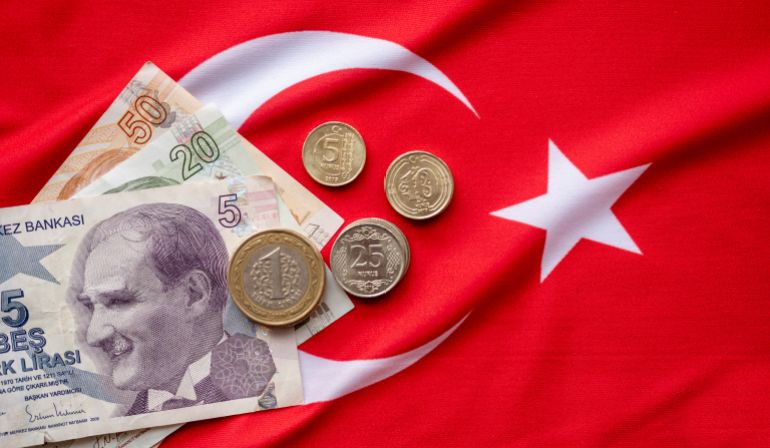 1697028337 Close-up of Turkish Lira on Turkish Flag. Turkey's donation campaign. We are enough for us my turkey Turkish: Hashtag bizbizeyeteriz Turkiyem. Keywords ShutterStock, Shutter Stock, symbol, buy, salary, banknote, donate, stock, cash, breaking, shopping, crisis, epidemic, bill, investment, economy, covid19, market, background, success, turkey, turkish, exchange, support, coin, financial, foreign, recession, paper, rate, currency, hospital, corona, lira, illness, wealth, disease, business, coronavirus, covid-19, health, control, flu, help, trade, money, tl, headache, healthcare and medicine, economic, finance