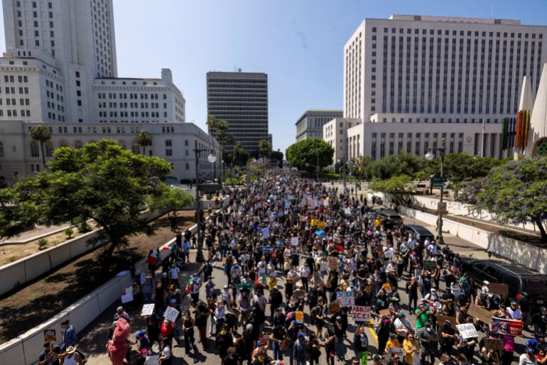 Demonstrators leave City Hall and make their way to the Metropolitan Detention Center during a protest against federal immigration sweeps, in downtown Los Angeles, California, U.S. June 8, 2025. REUTERS/Barbara Davidson TPX IMAGES OF THE DAY