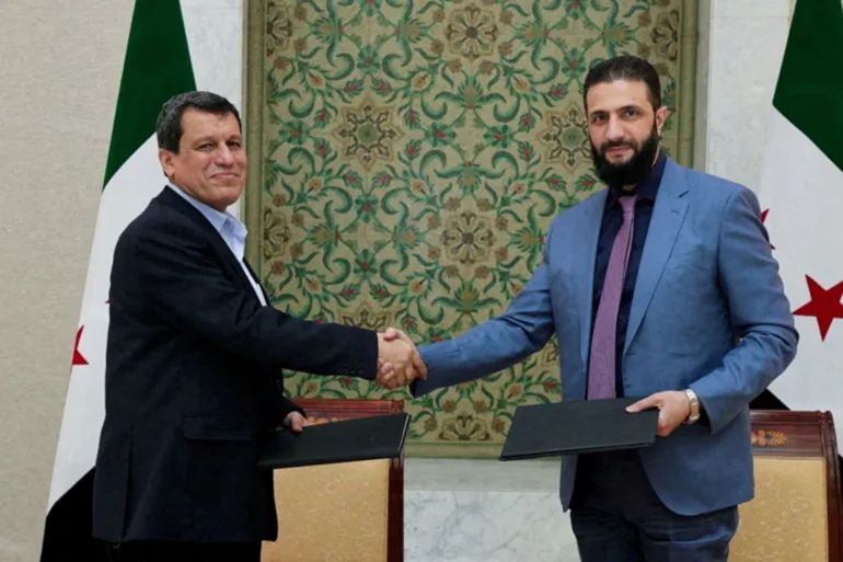 سوريا - دمشق - وصف اتفاق دمشق و"قسد" بأنه اتفاق تاريخي ويمهد لمرحلة جديدة في سوريا (الجزيرة)