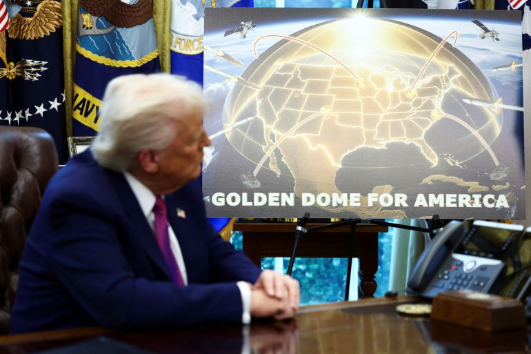 U.S. President Donald Trump looks on as he makes an announcement regarding the Golden Dome missile defense shield with U.S. Defense Secretary Pete Hegseth (not pictured) in the Oval Office of the White House in Washington, D.C., U.S., May 20, 2025. REUTERS/Kevin Lamarque