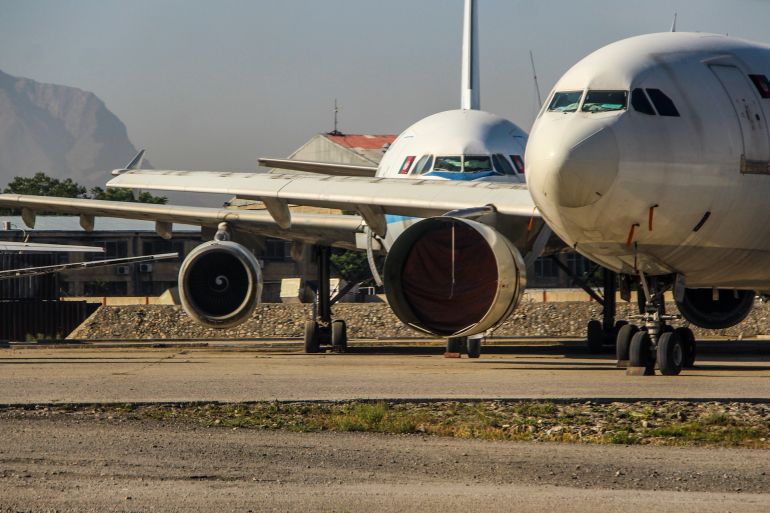 Kabul, Afghanistan, August, 14, 2021, Kabul airport with the rush of commercial and military aircraft to depart the country before the Taliban advance; Shutterstock ID 2027869796; purchase_order: aj; job: ; client: ; other: