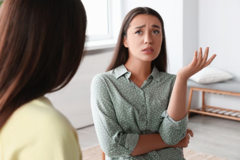 Psychologist working with young woman